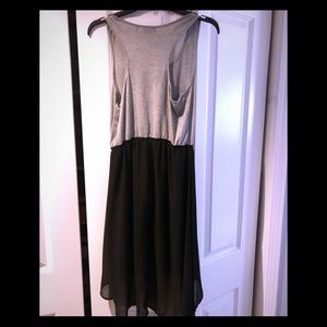Adorable High Low Dress with sheer overlay